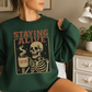 Staying Alive Skeleton Coffee Sweatshirt – Retro Vintage Halloween Coffee Lover Pullover